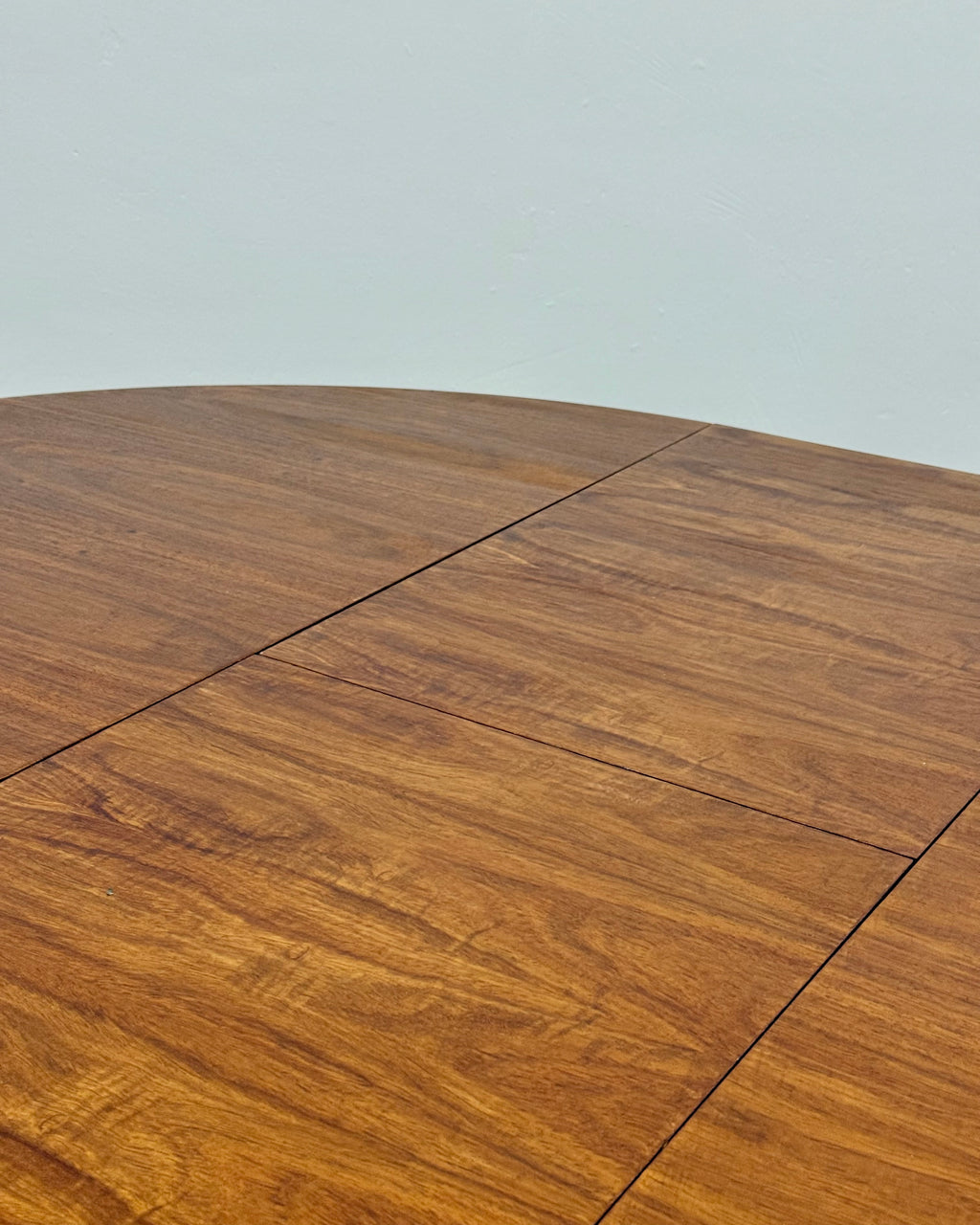 MID-CENTURY ROUND DINING TABLE (EXTENDABLE)