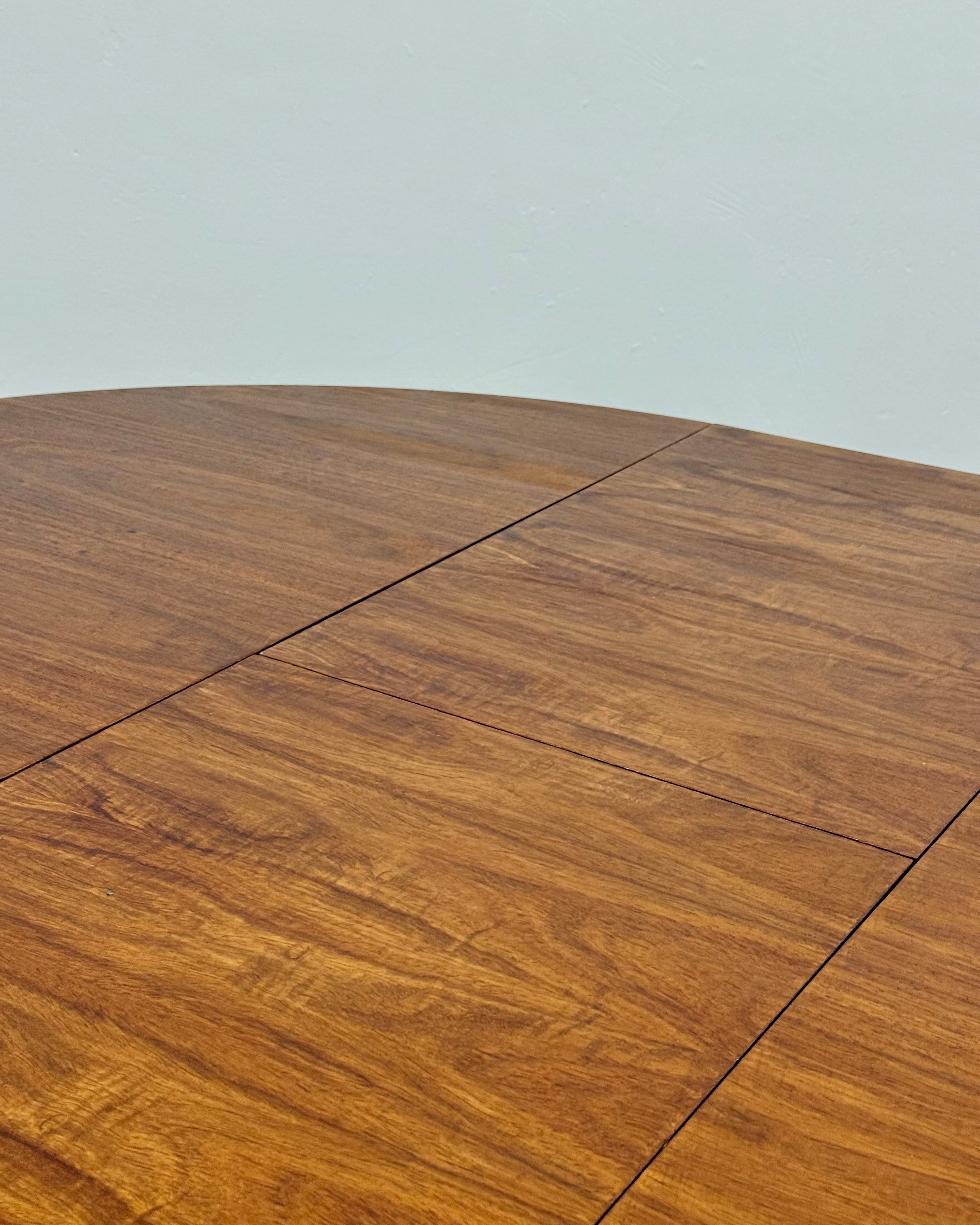 MID-CENTURY ROUND DINING TABLE (EXTENDABLE)