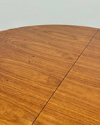MID-CENTURY ROUND DINING TABLE (EXTENDABLE)