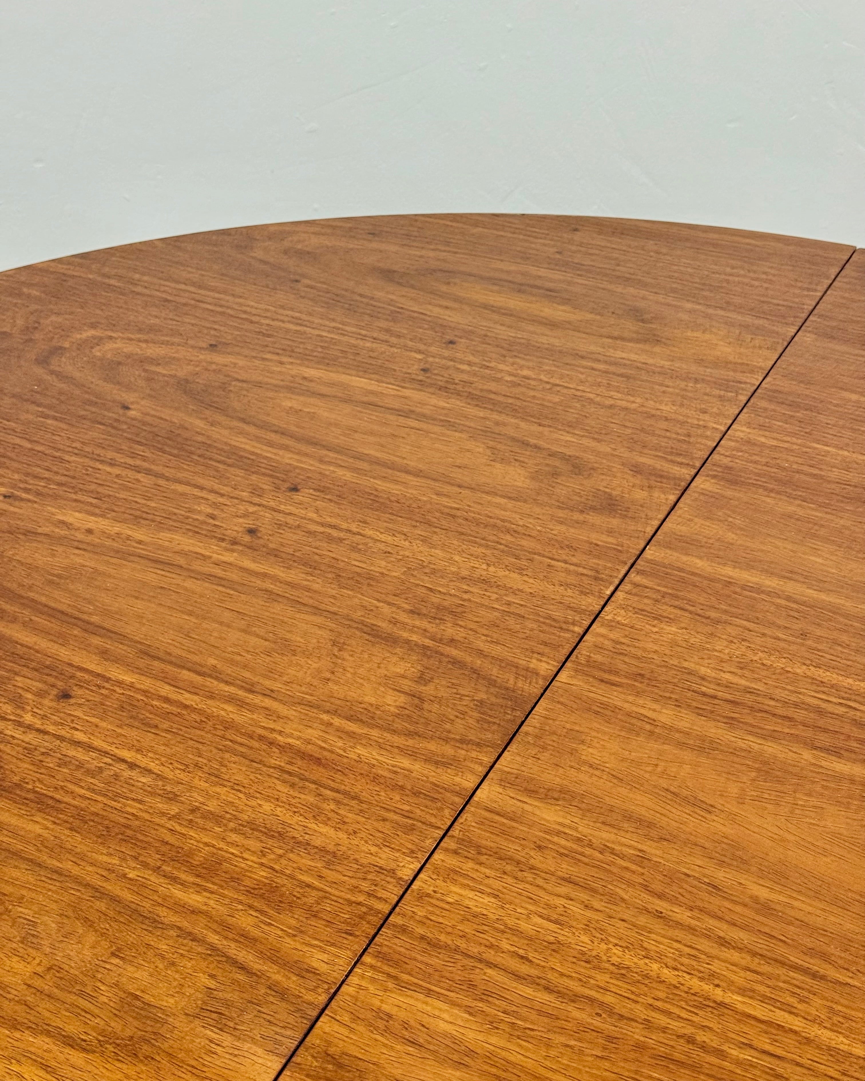 MID-CENTURY ROUND DINING TABLE (EXTENDABLE)